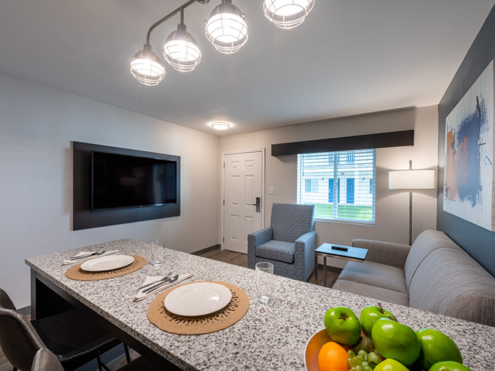 View of kitchen and living room television